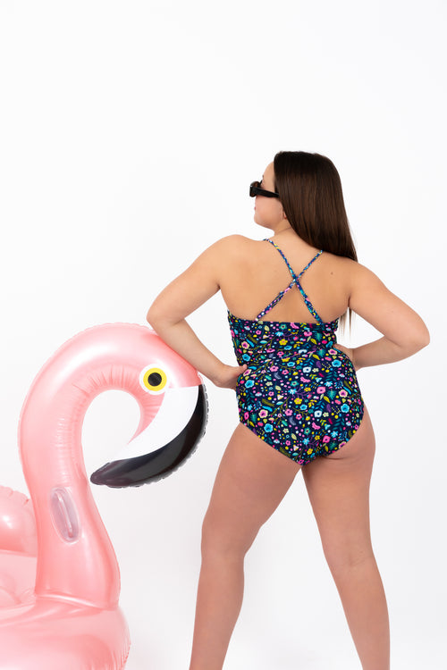 Coastal Bloom Teen Tween one-piece Swimsuit Swimwear with adjustable straps, ruched sides and age-appropriate coverage. Full Coverage bum.