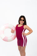 The OG Teen Tween girls one-piece Swimsuit Swimwear. Boyleg design with gold clasp strap back. Berry Color with pink side stripes. Full coverage bum. Age-appropriate coverage, UPF50+ and thin removable inserts.