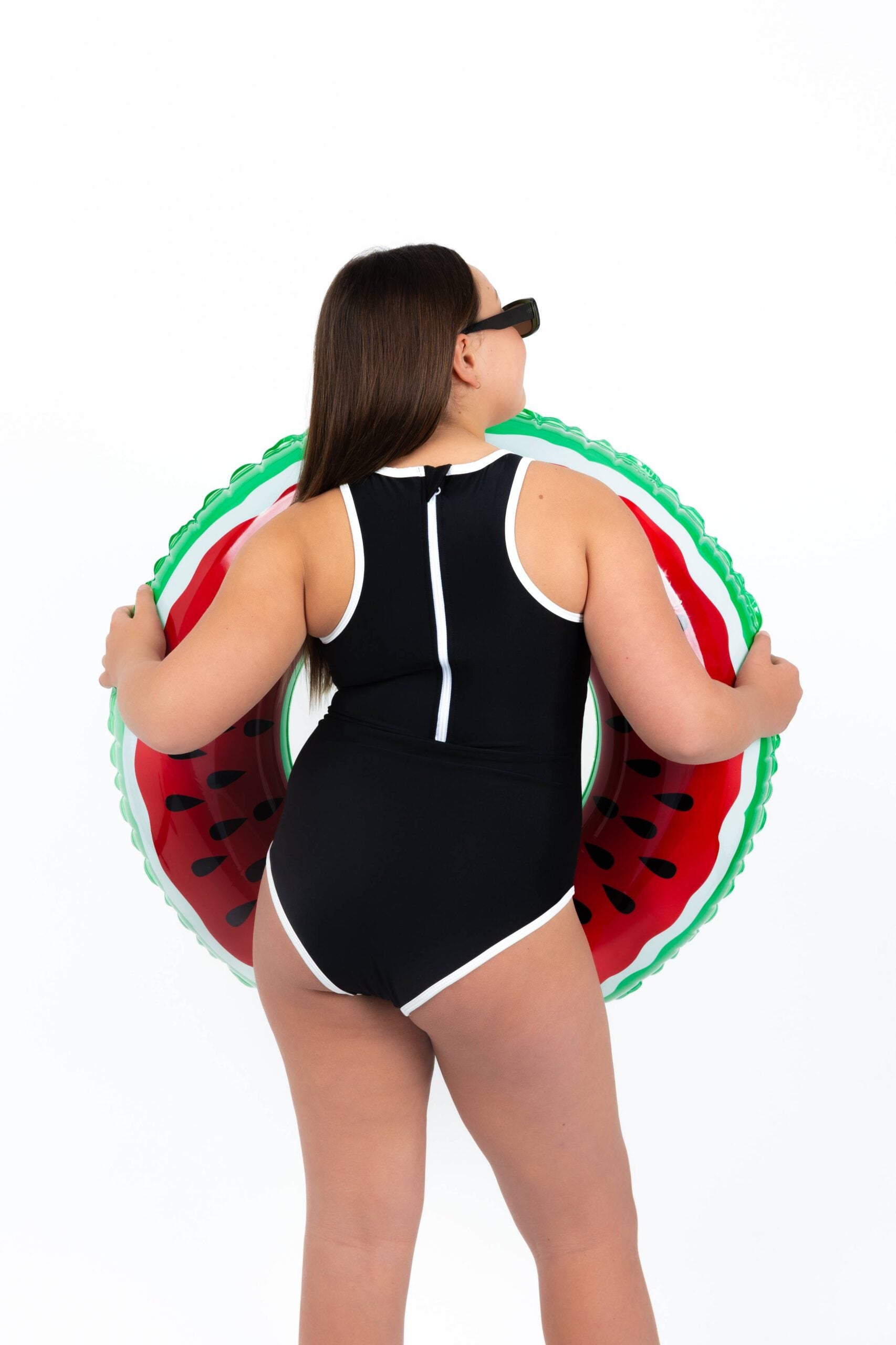 Midnight Current Teen Tween Girls one-piece Swimsuit Swimwear with high neck line, back zipper, removable inserts and age-appropriate cover. Full  coverage bum. Black and white, sporty and active design. 