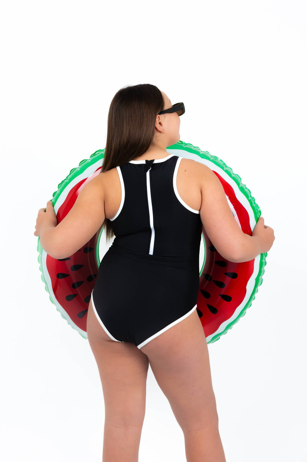 Midnight Current Teen Tween Girls one-piece Swimsuit Swimwear with high neck line, back zipper, removable inserts and age-appropriate cover. Full  coverage bum. Black and white, sporty and active design. 