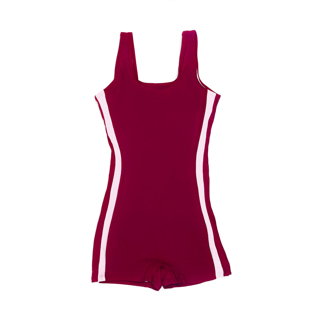 The OG Teen Tween girls one-piece Swimsuit Swimwear. Boyleg design with gold clasp strap back. Berry Color with pink side stripes. Full coverage bum. Age-appropriate coverage, UPF50+ and thin removable inserts.